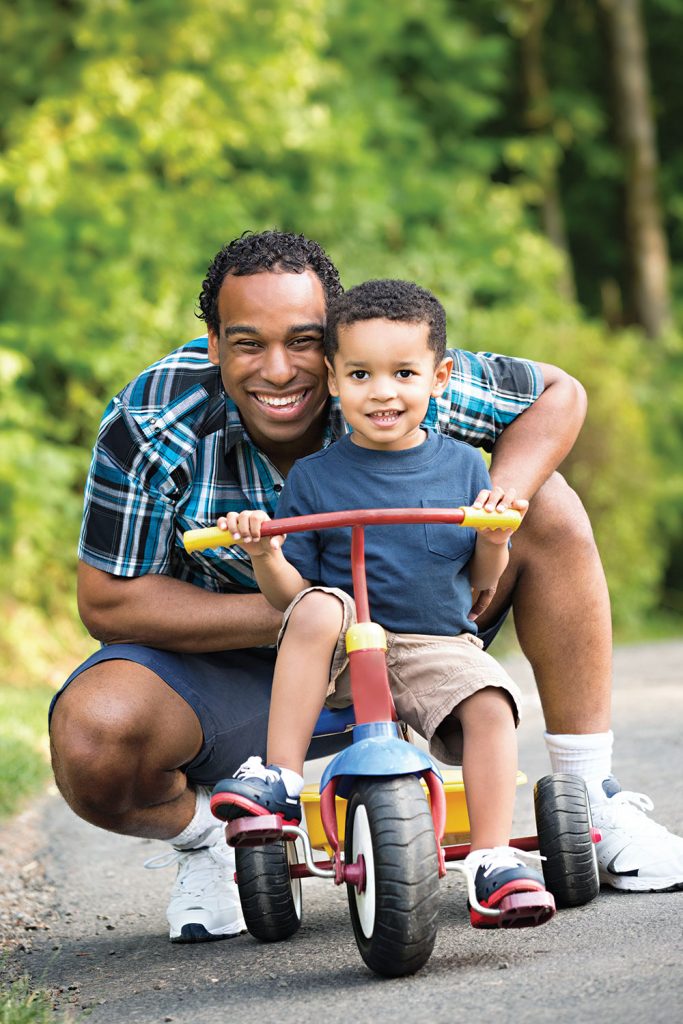 Father and So on a tricycle | PTCNE First Visit